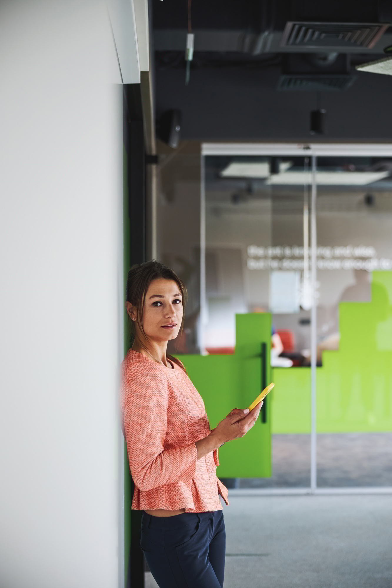 Beautiful young caucasian woman branding consultant working in the co-working space