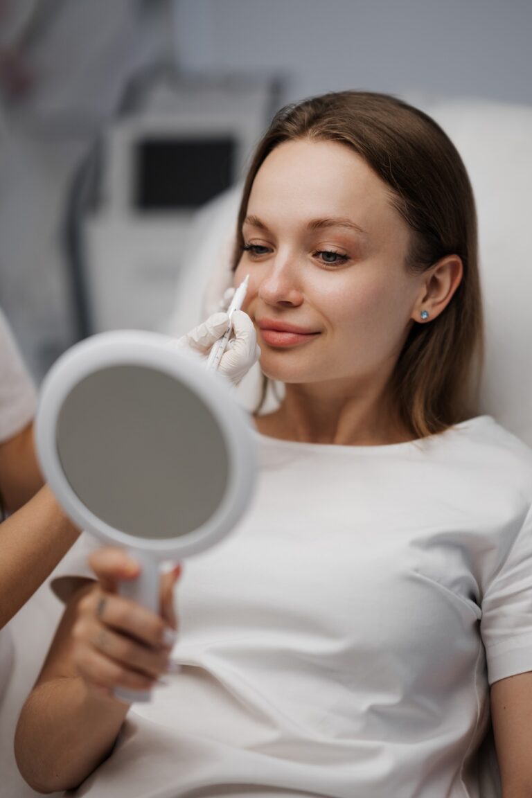 A woman getting her eyebrows done