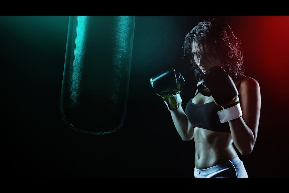 Powerful image of a woman boxer preparing to train with a punching bag in a dramatic dark setting.