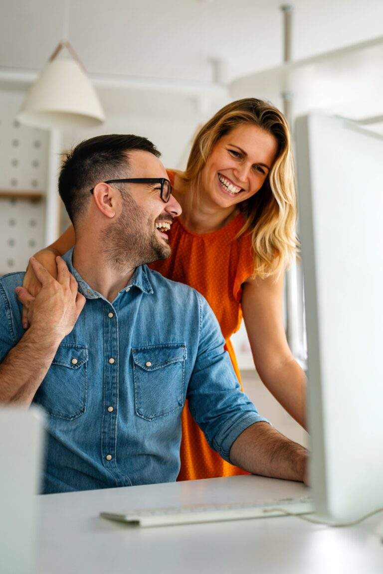 Website design & seo in new braunfels 2 seo, web design & marketing agency town press media Happy couple doing business together working at small office