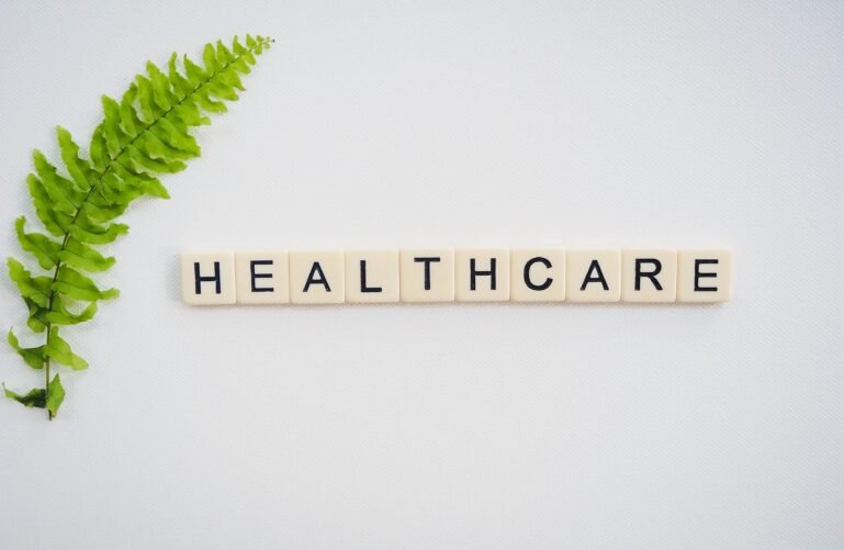 scrabble tiles spelling out the word healthcare