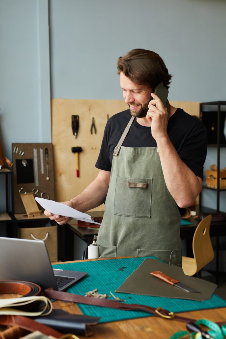 Town press media 2 seo, web design & marketing agency town press media Smiling craftsman managing small business
