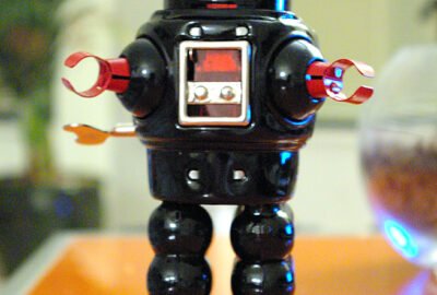 a toy robot sitting on top of a table